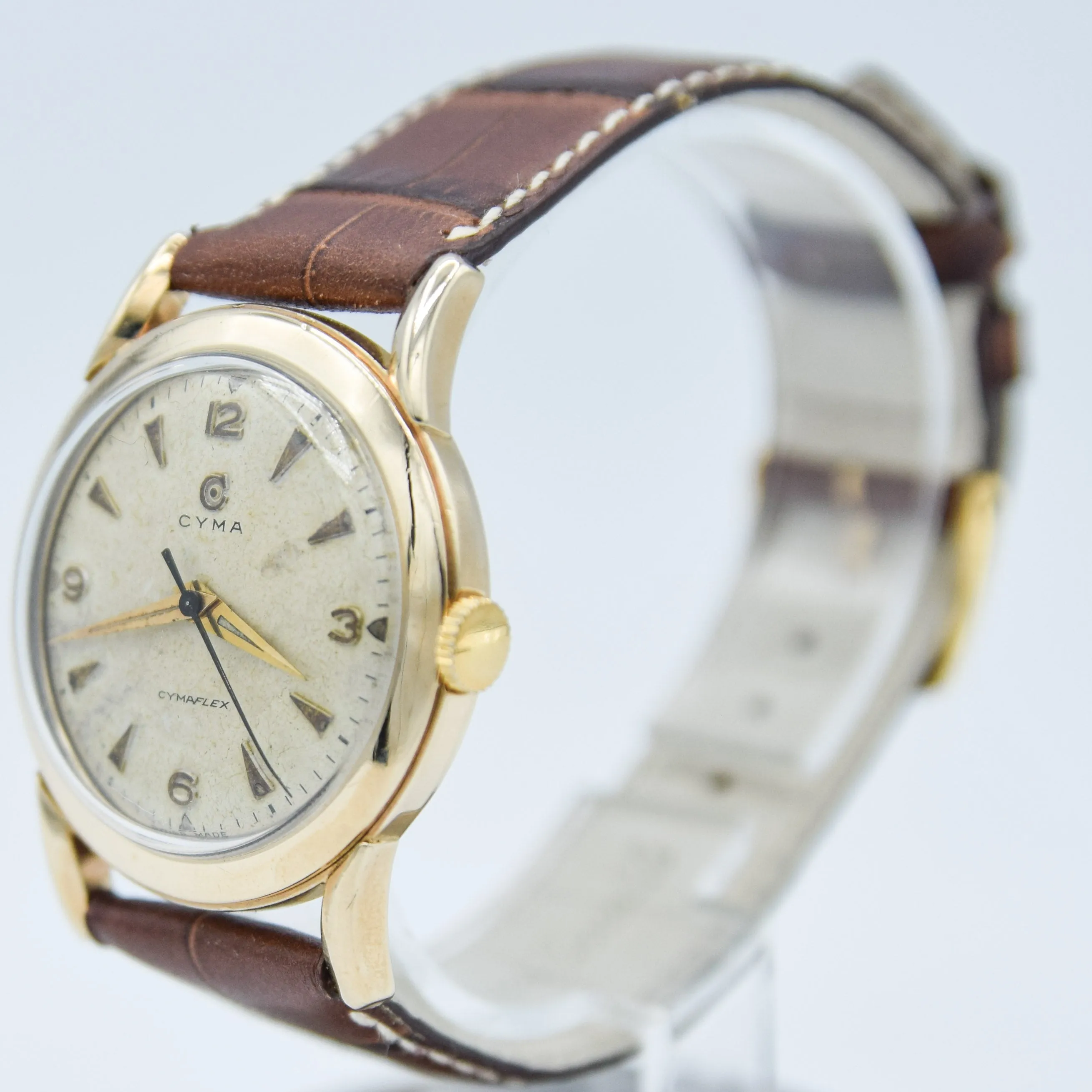 1954 Cyma Cymaflex Wristwatch Bombe Style Lugs and Mixed Arabic and Arrow Batons in Solid 9ct Gold with Original Box