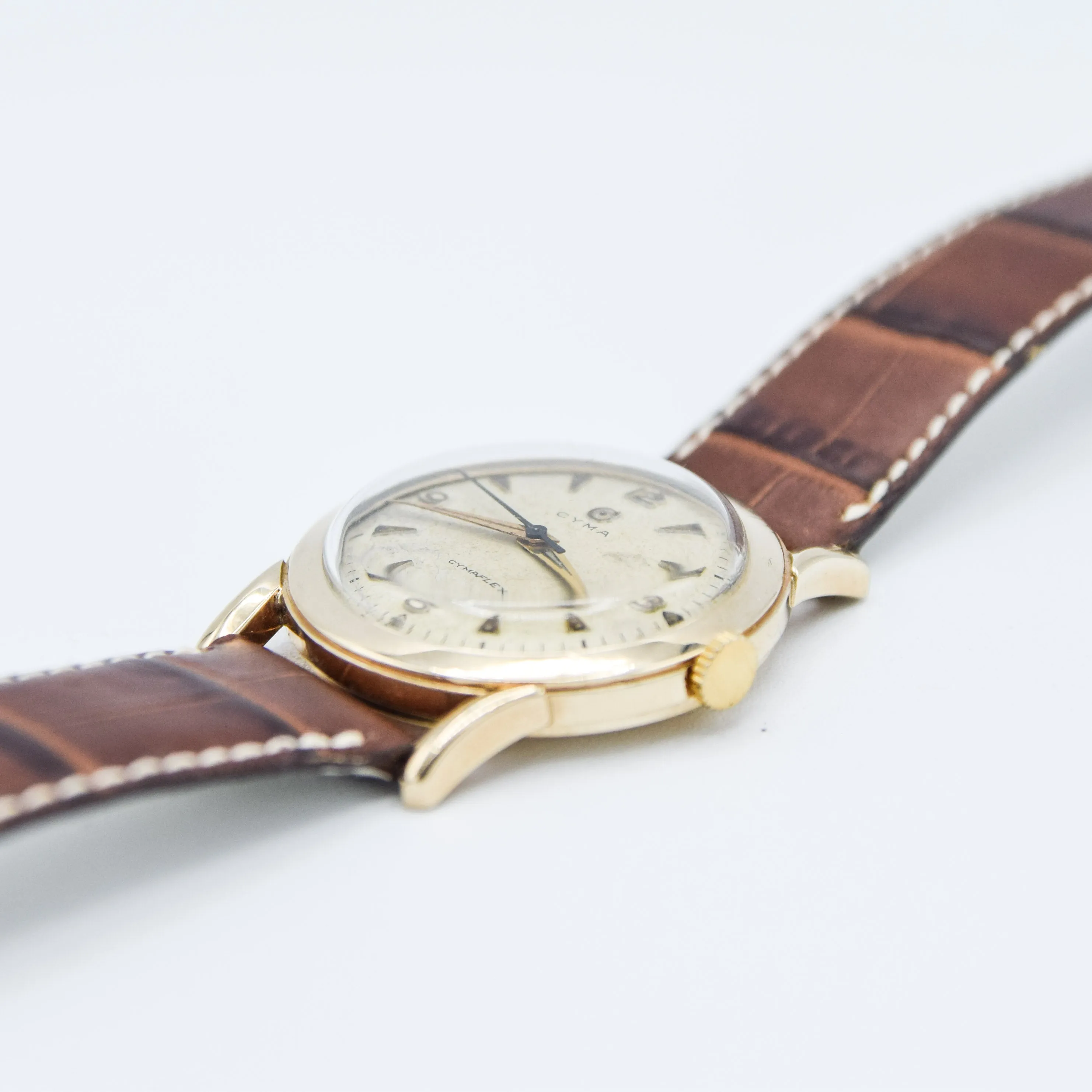 1954 Cyma Cymaflex Wristwatch Bombe Style Lugs and Mixed Arabic and Arrow Batons in Solid 9ct Gold with Original Box