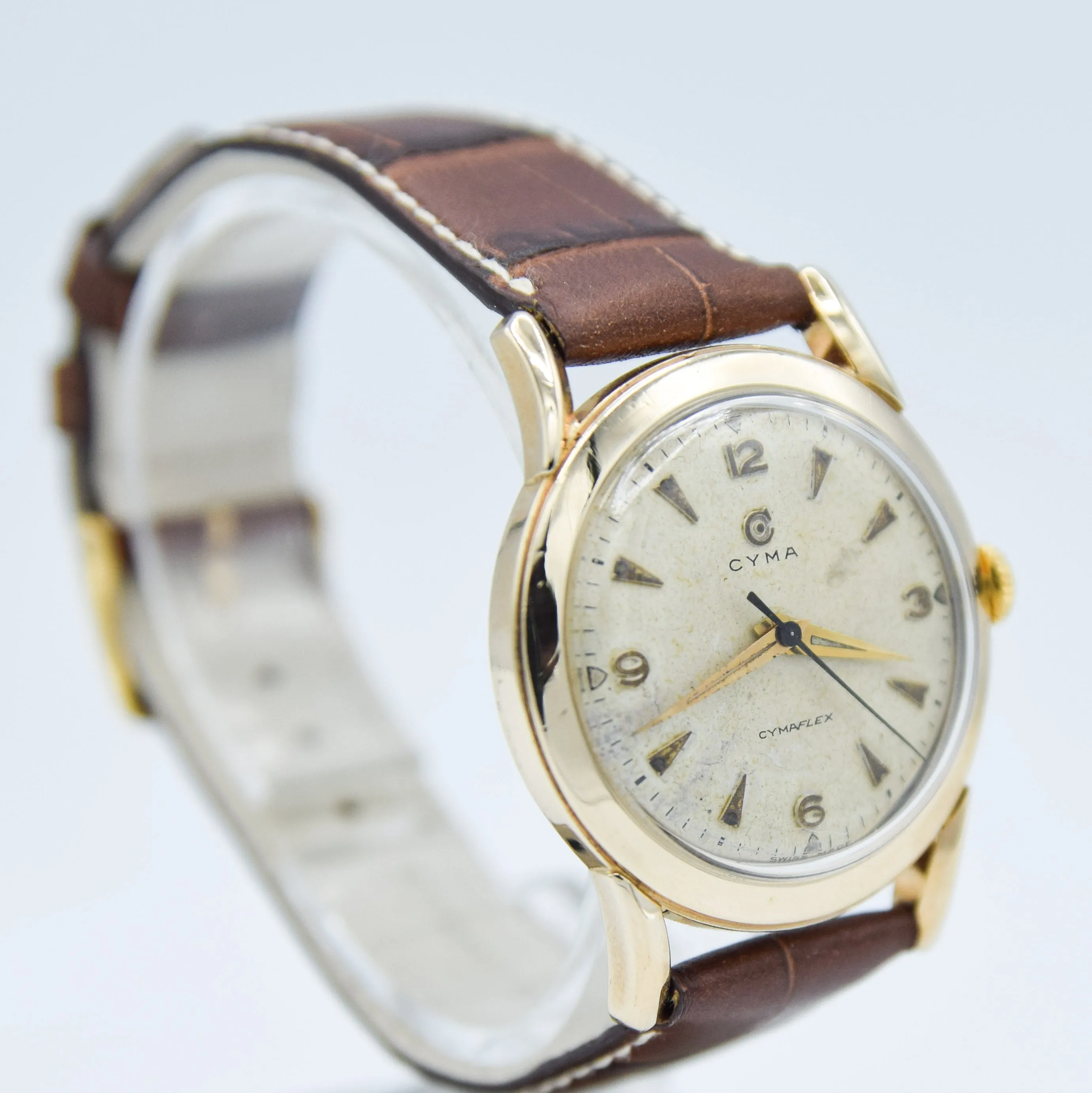 1954 Cyma Cymaflex Wristwatch Bombe Style Lugs and Mixed Arabic and Arrow Batons in Solid 9ct Gold with Original Box