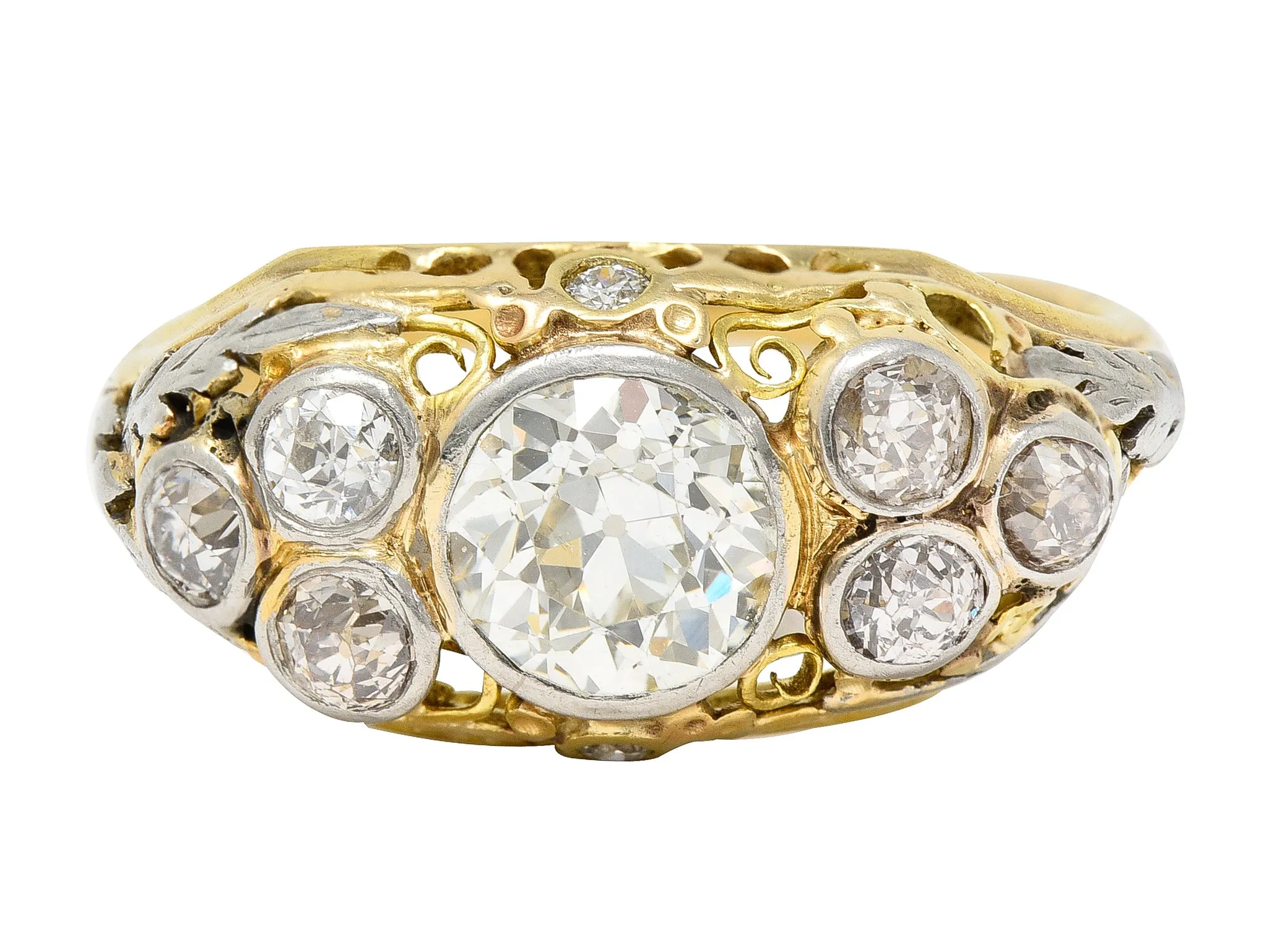 Arts & Crafts 1.95 CTW Old European Cut Diamond Platinum-Topped 14 Karat Yellow Gold Scrolling Foliate Antique Engagement Ring