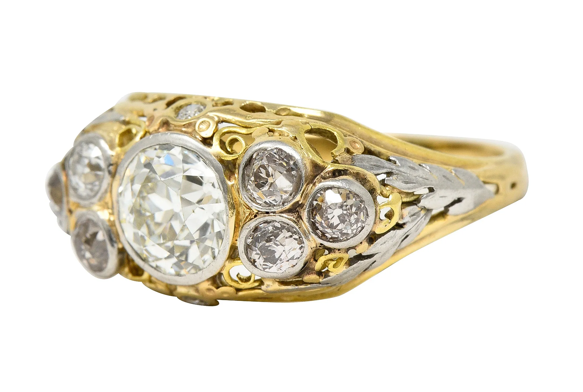 Arts & Crafts 1.95 CTW Old European Cut Diamond Platinum-Topped 14 Karat Yellow Gold Scrolling Foliate Antique Engagement Ring