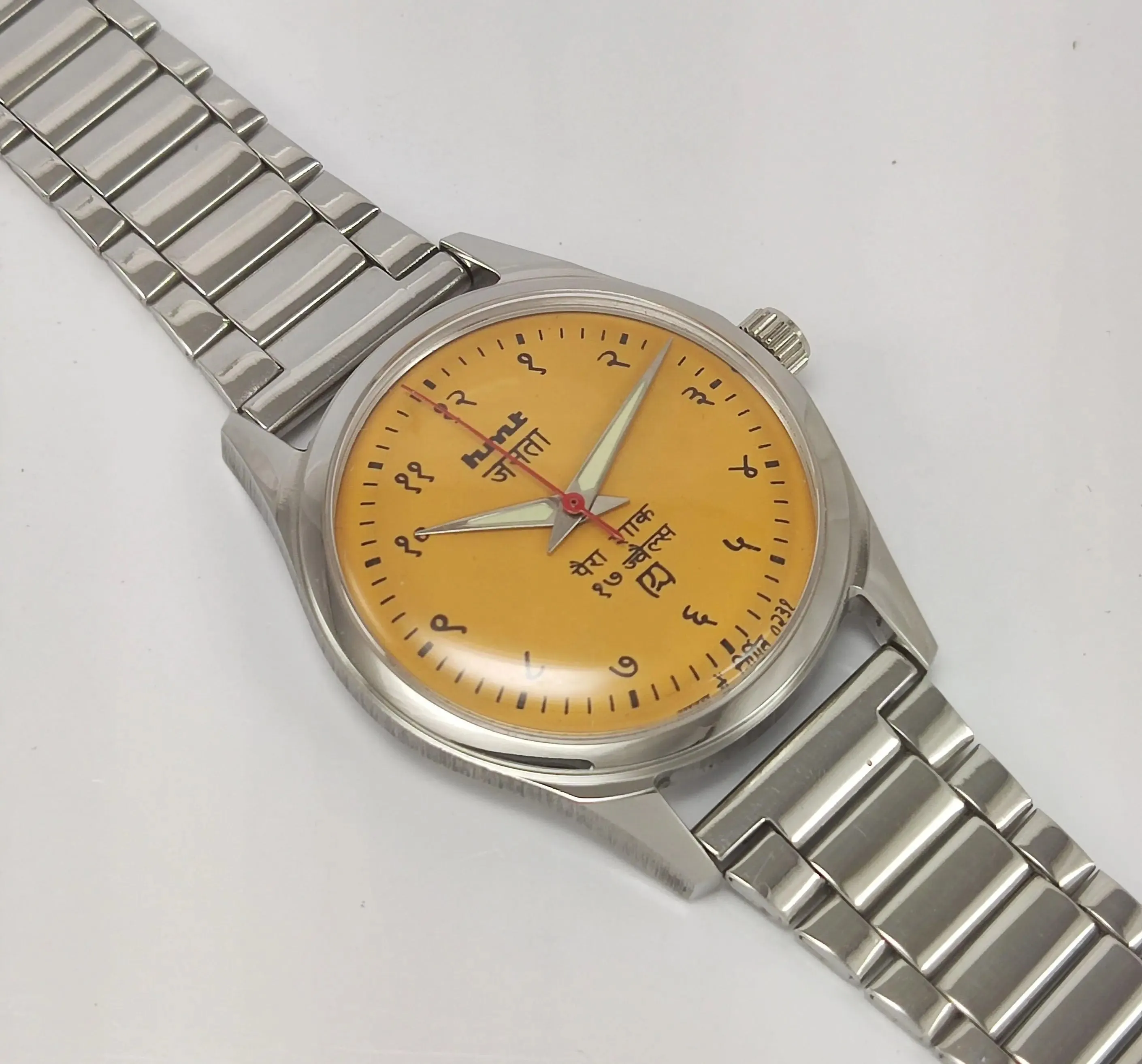HMT Janata Para Shock 17 Jewels Sun Yellow Devanagari Dial Transparent Back Mechanical Hand winding Men's Wrist Watch