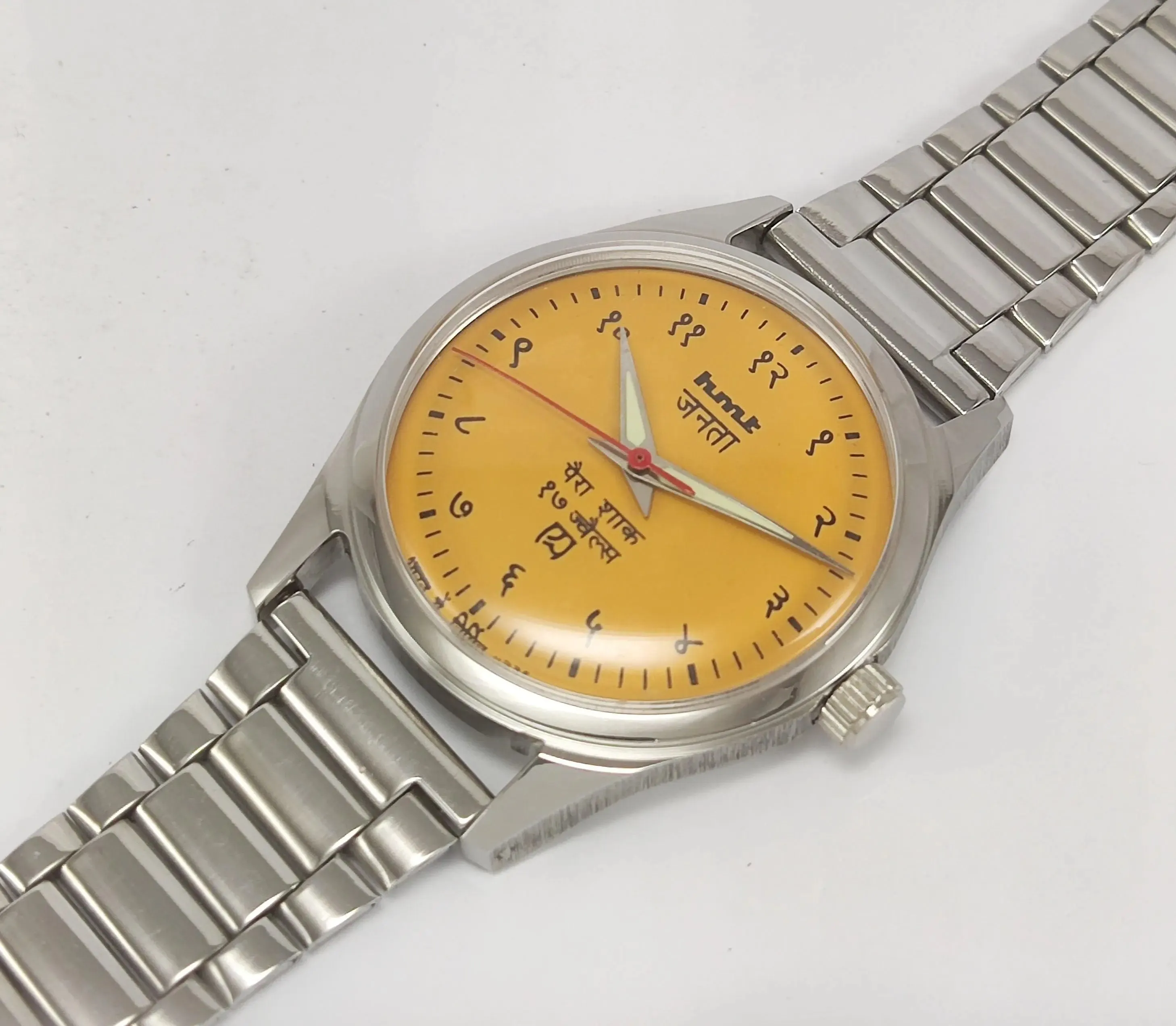 HMT Janata Para Shock 17 Jewels Sun Yellow Devanagari Dial Transparent Back Mechanical Hand winding Men's Wrist Watch