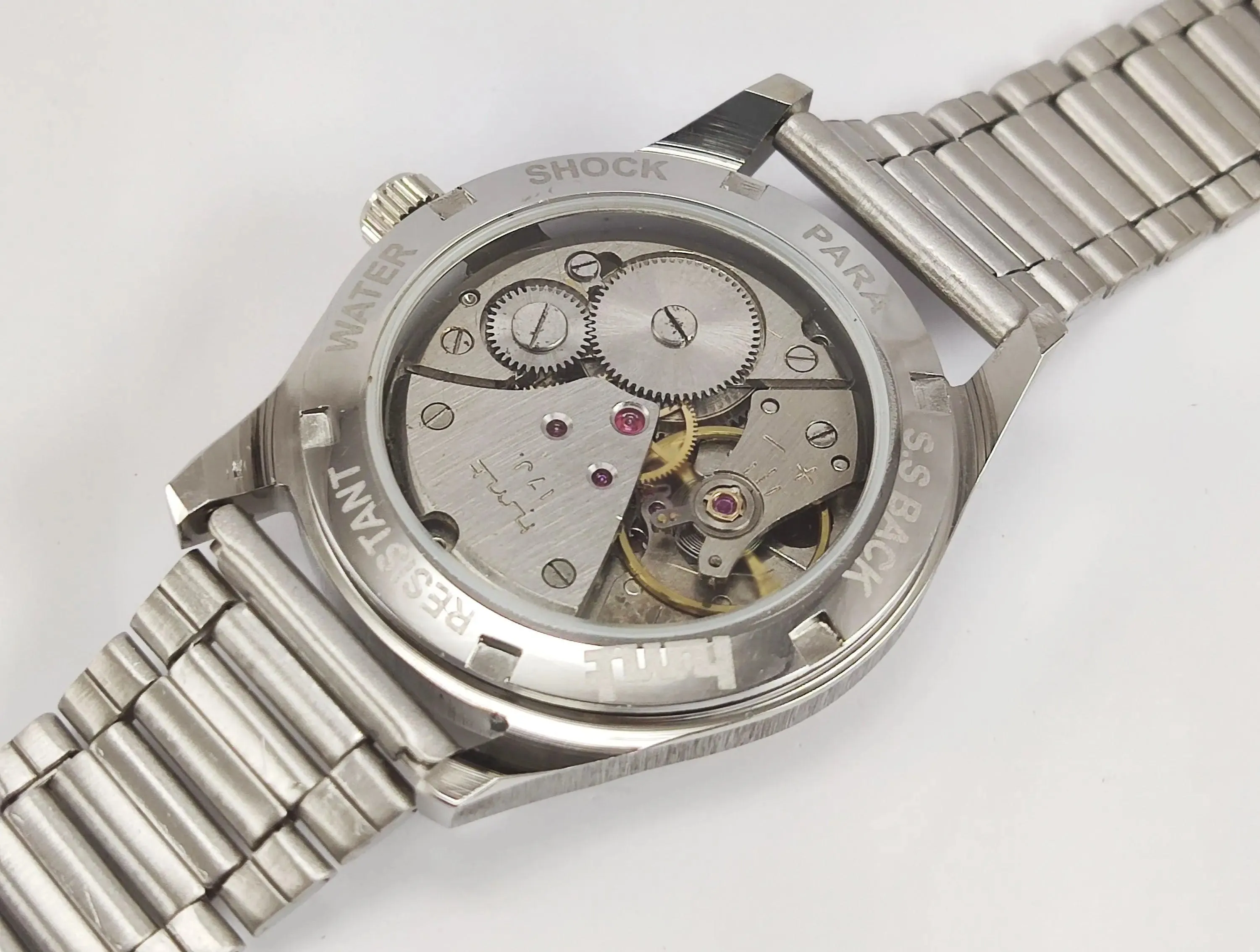 HMT Janata Para Shock 17 Jewels Sun Yellow Devanagari Dial Transparent Back Mechanical Hand winding Men's Wrist Watch