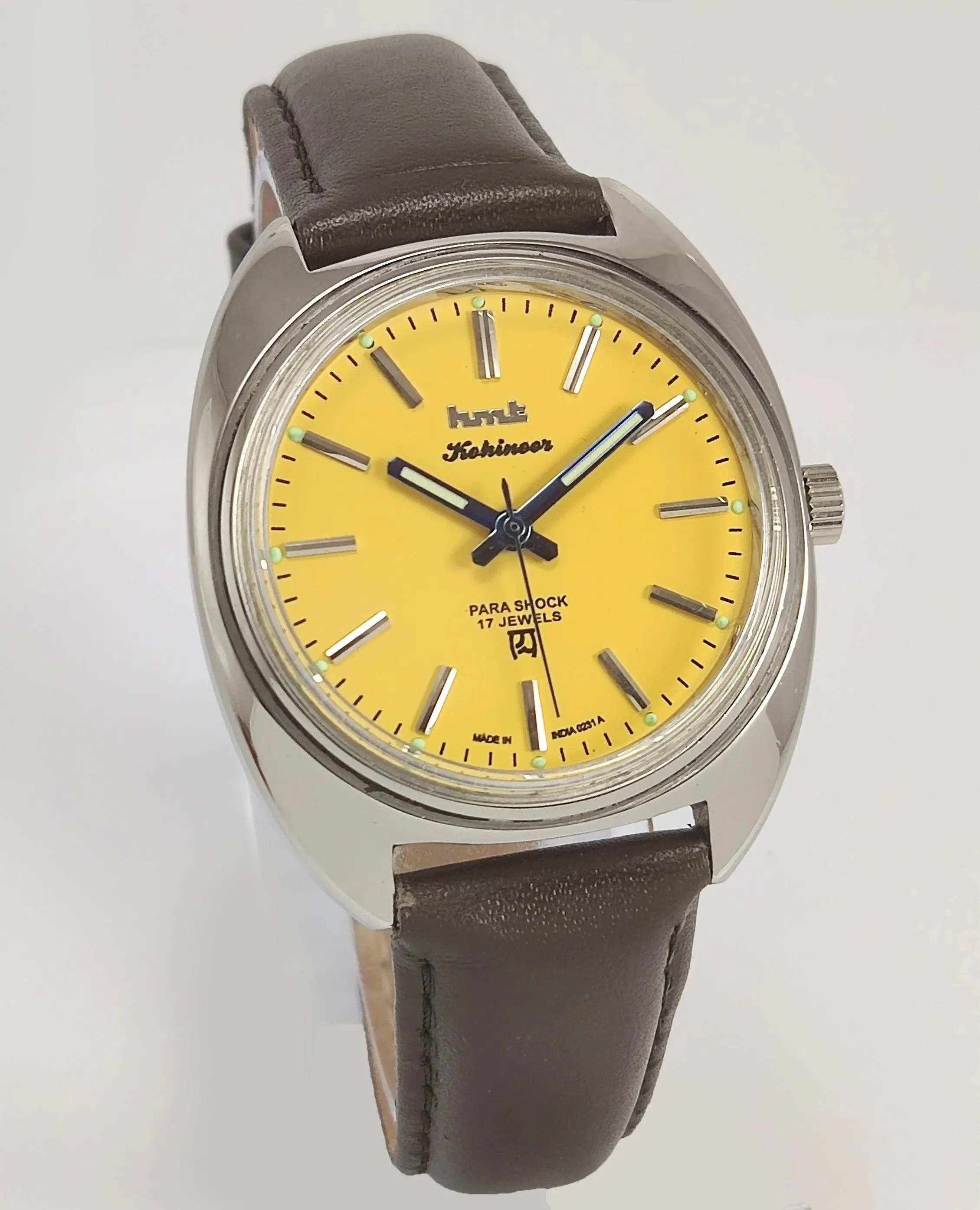 HMT Kohinoor Para Shock 17 Jewels Yellow Dial Transparent Back Mechanical Hand winding Men's Wrist Watch