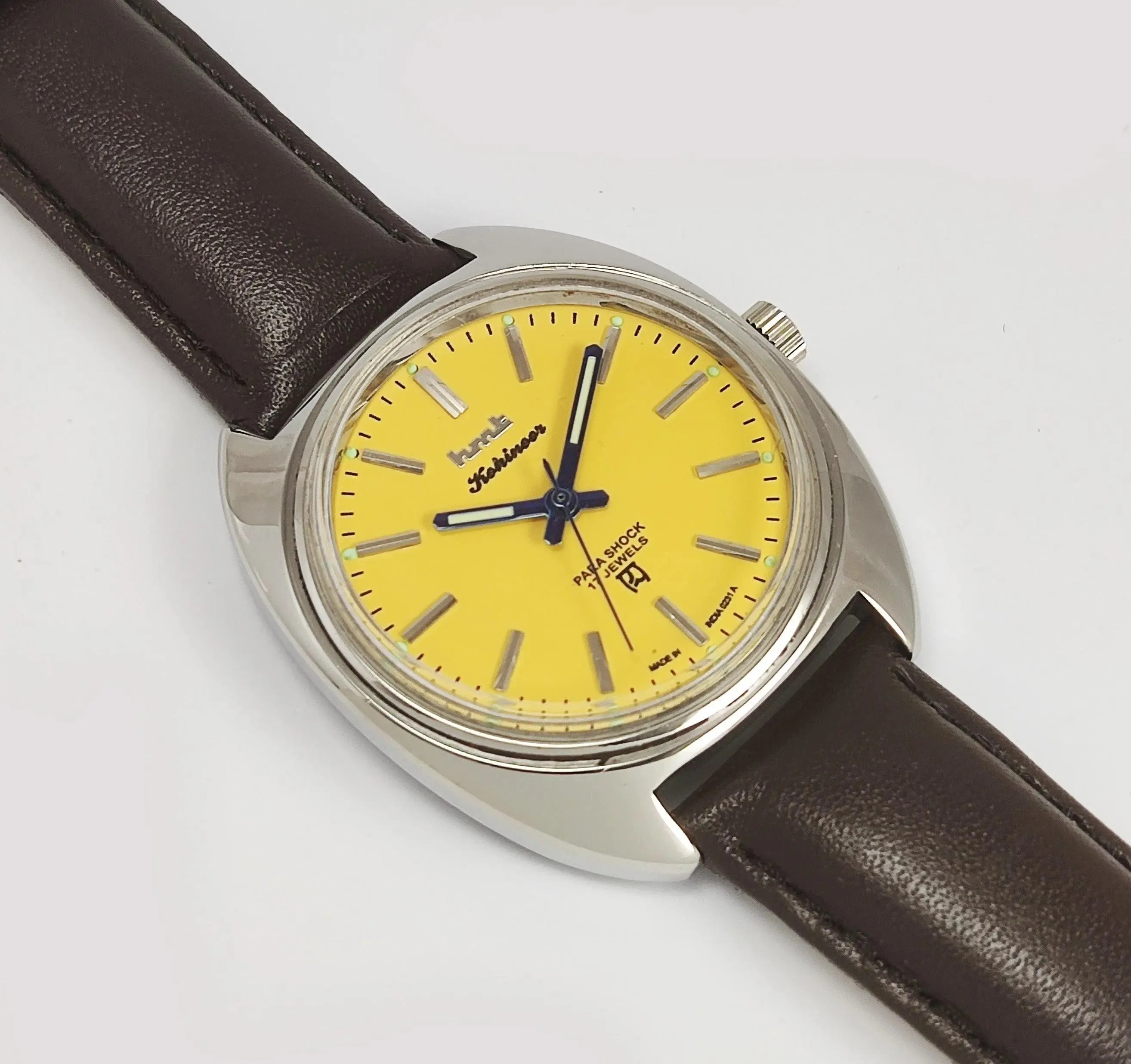 HMT Kohinoor Para Shock 17 Jewels Yellow Dial Transparent Back Mechanical Hand winding Men's Wrist Watch